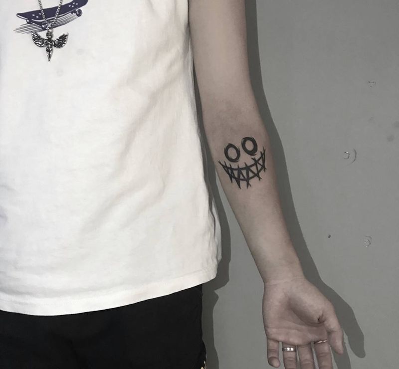 笑脸纹身图片_图腾纹身图案