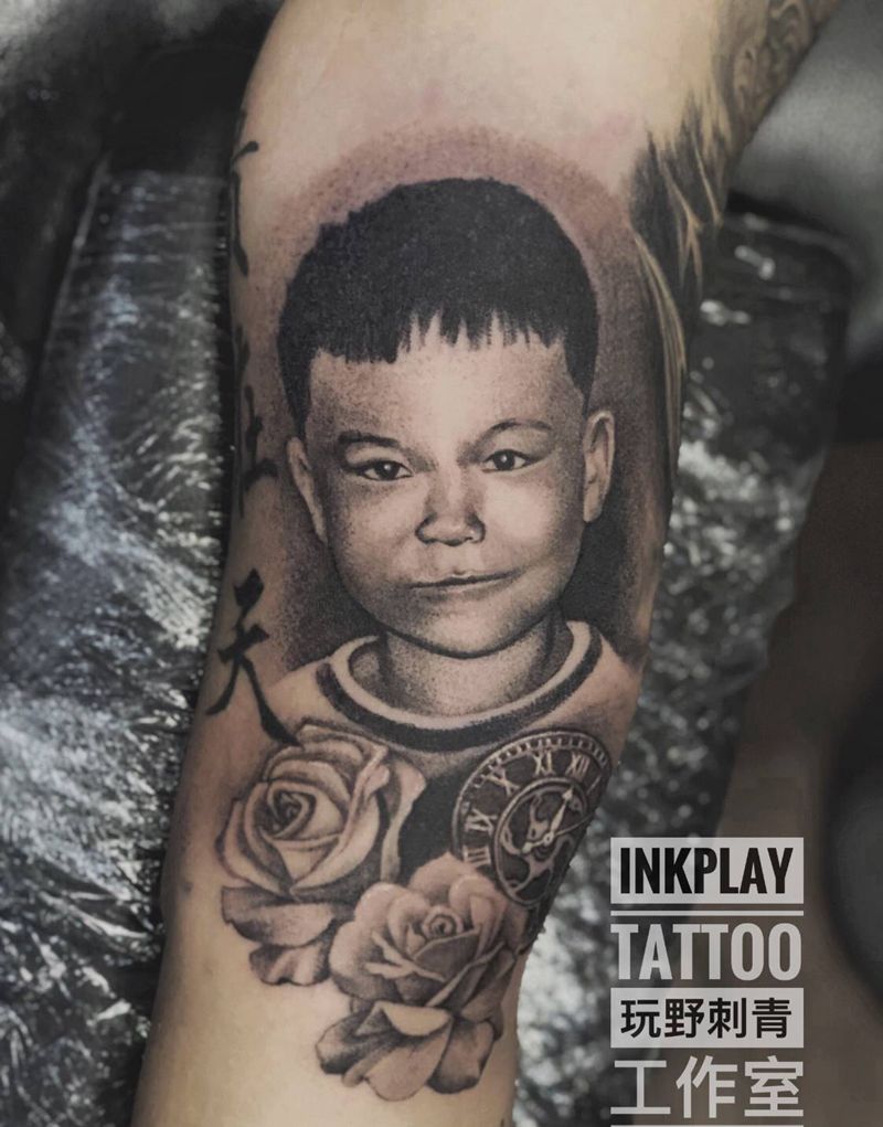 纪念亲人纹身图片_手臂欧美写实纹身图案