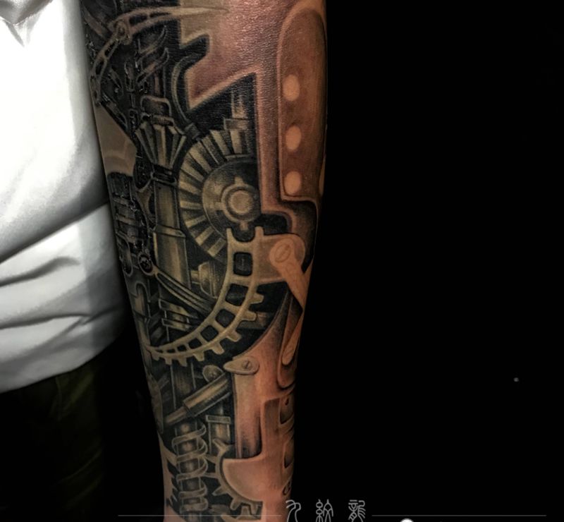 机械未完纹身图片_手臂欧美写实几何纹身图案