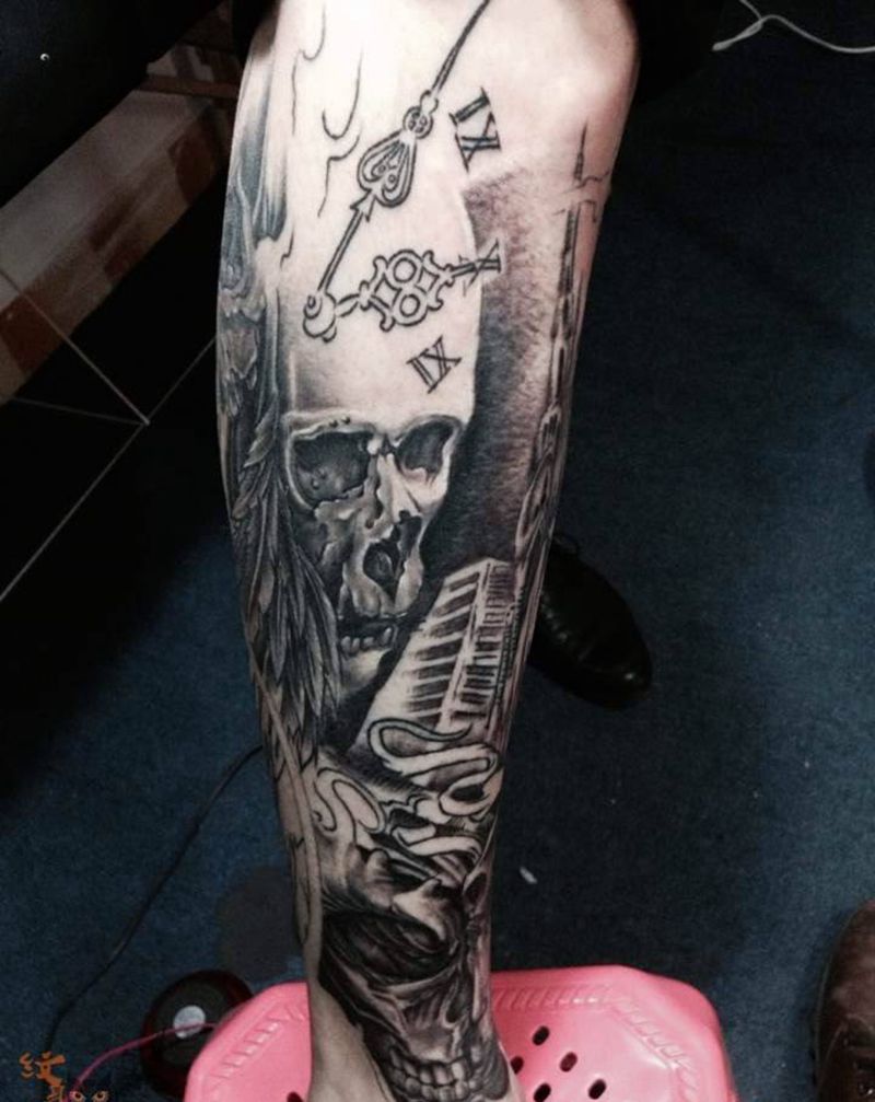 包小腿纹身图片_欧美鬼神腿部纹身图案