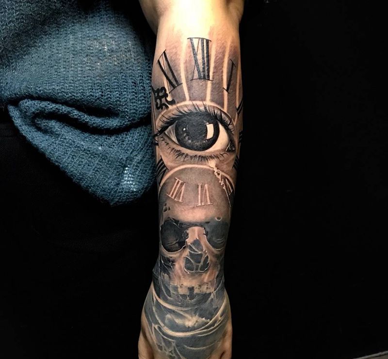 骷髅眼睛时钟纹身图片_手臂手部欧美写实纹身图案