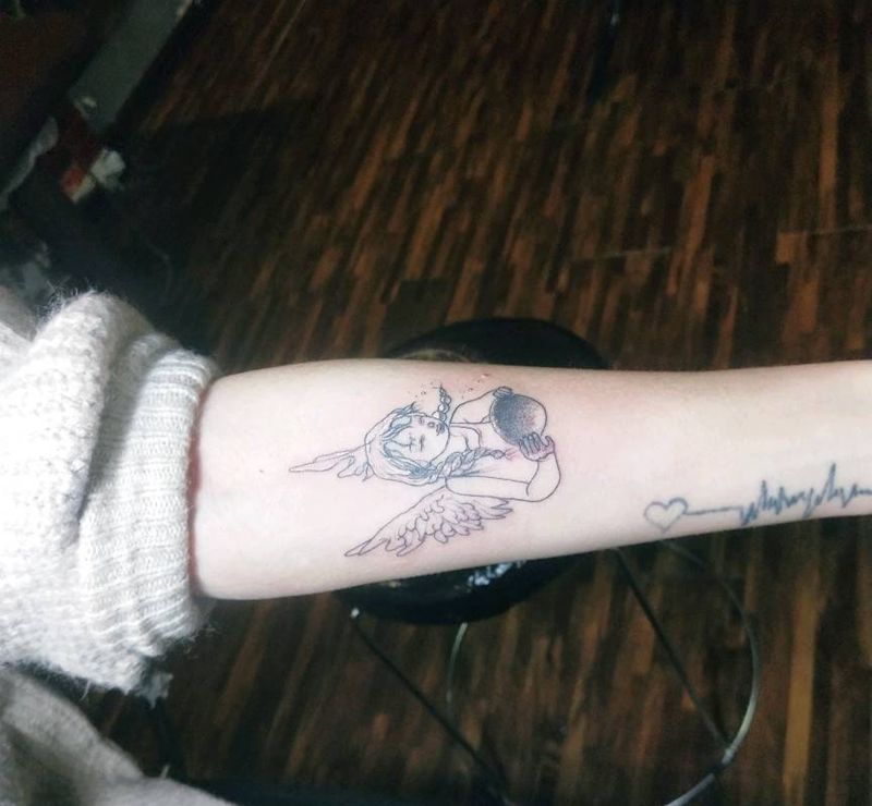 原宿风纹身图片_手臂纹身图案