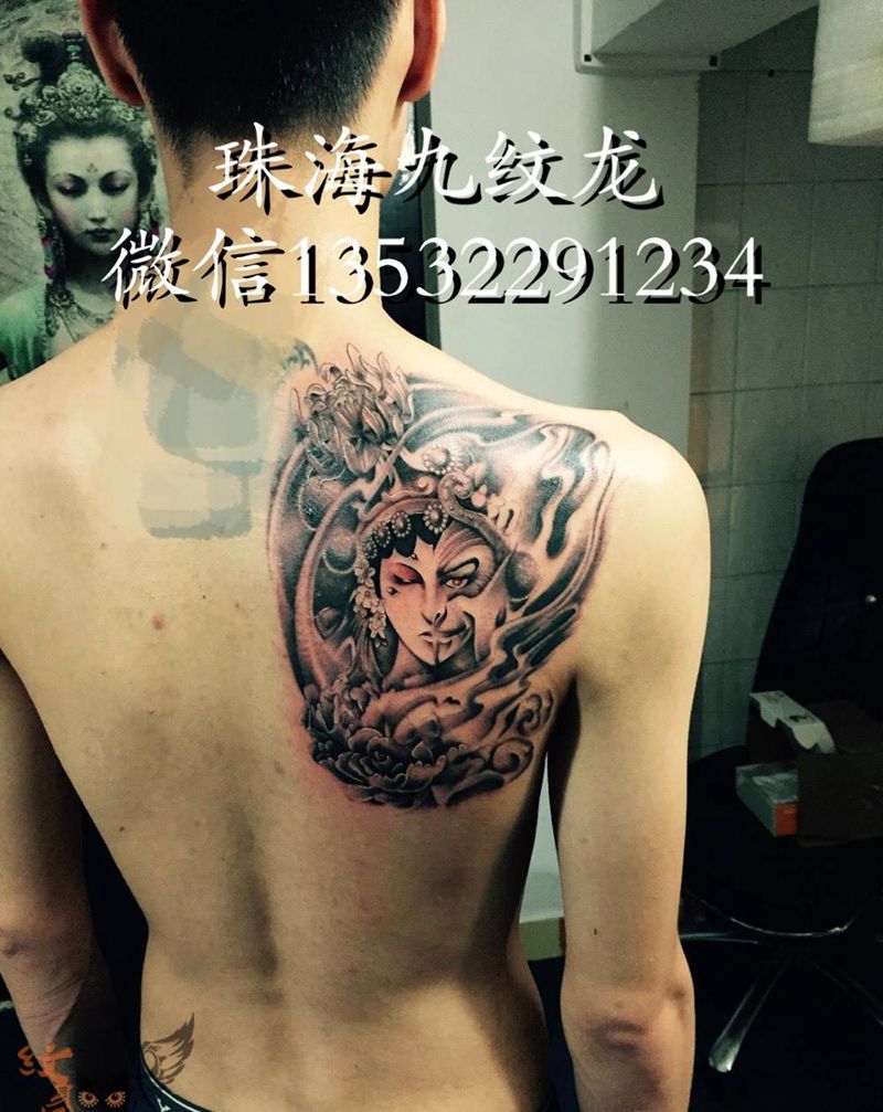 猴王花旦纹身图片_成品背部传统鬼神纹身图案