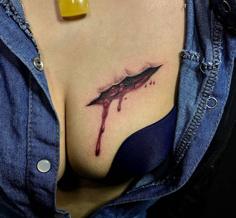 伤纹身图片_胸部欧美写实纹身图案