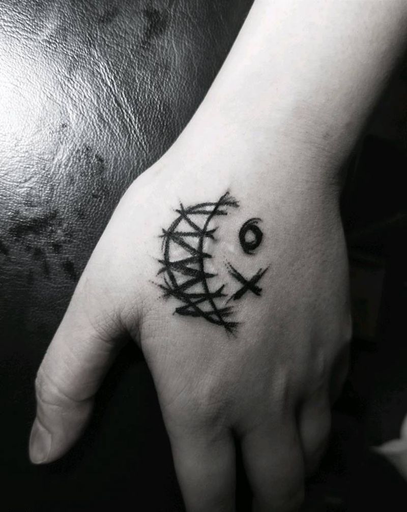 恶魔之笑纹身图片_手部纹身图案