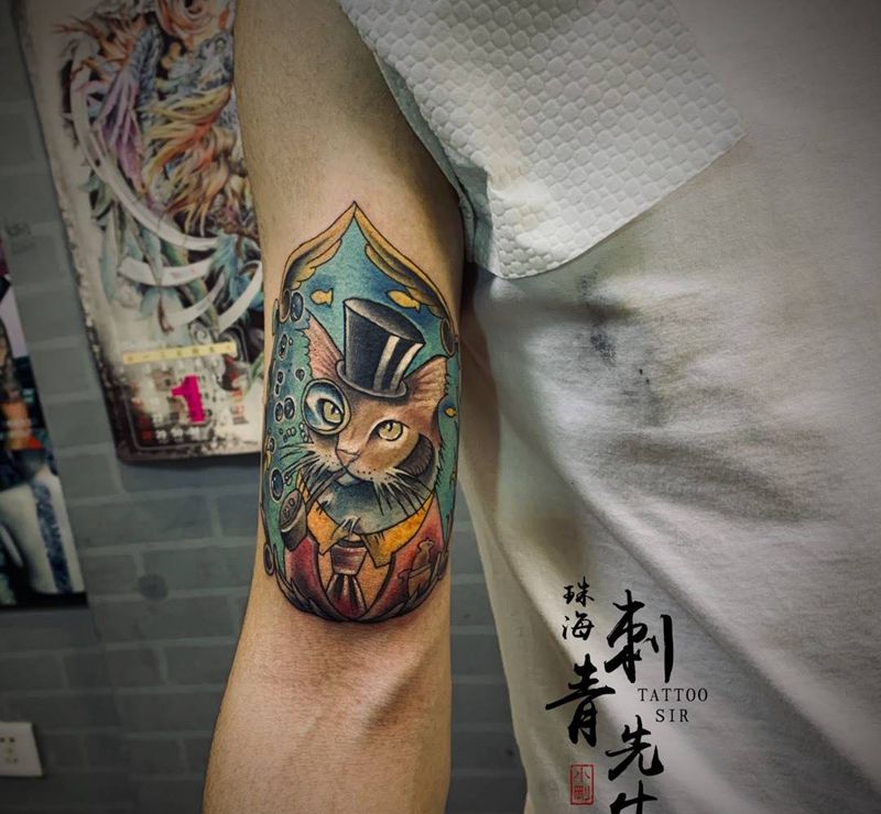 （绅士猫）纹身图片_手臂New School纹身图案