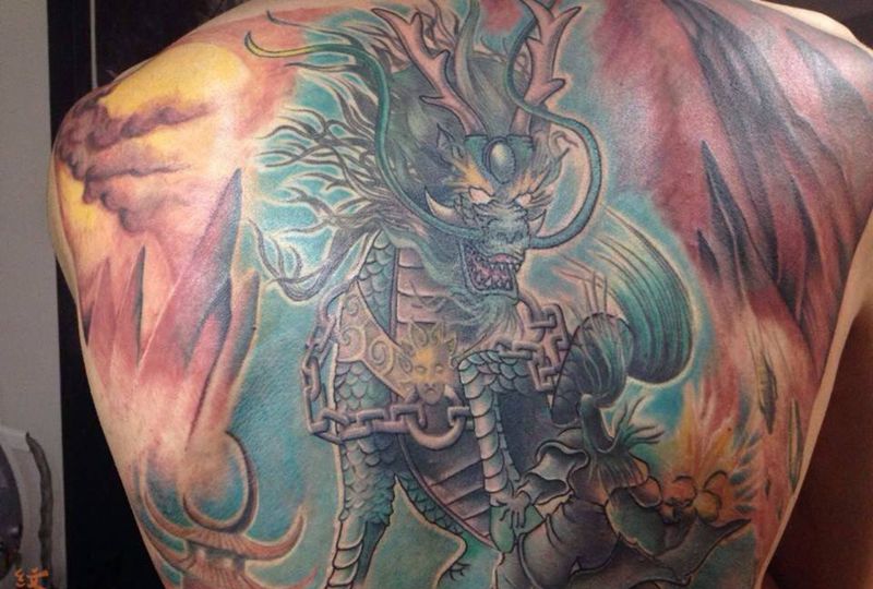 麒麟纹身图片_欧美鬼神背部纹身图案