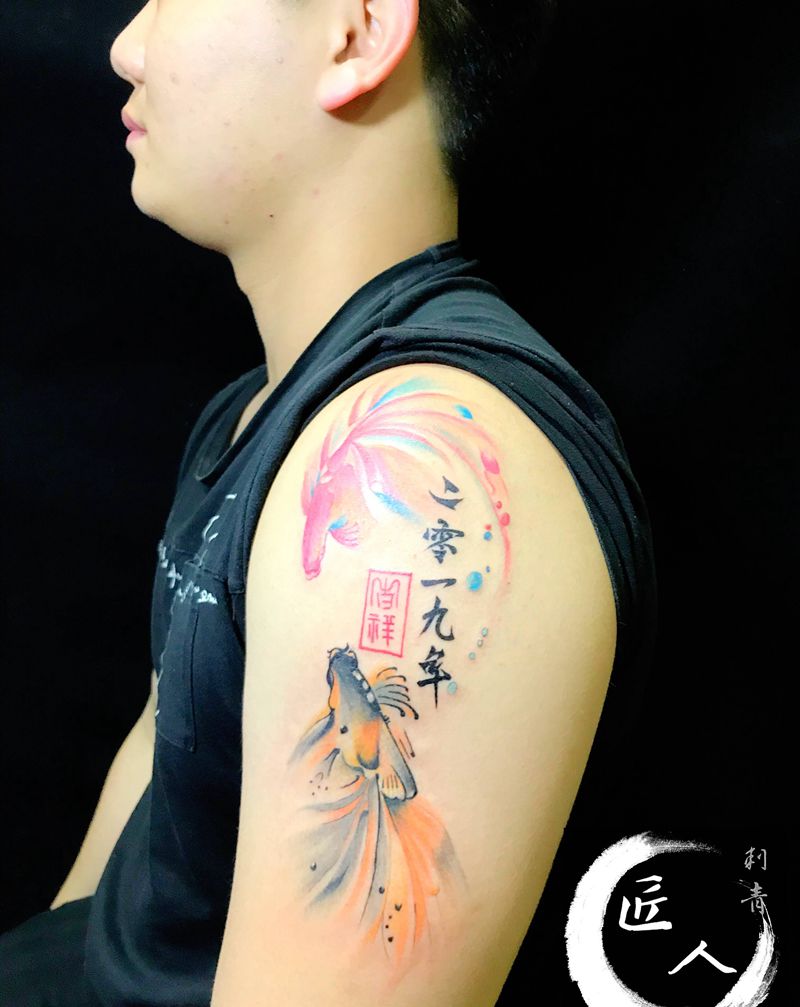 鱼纹身图片_手臂水彩纹身图案