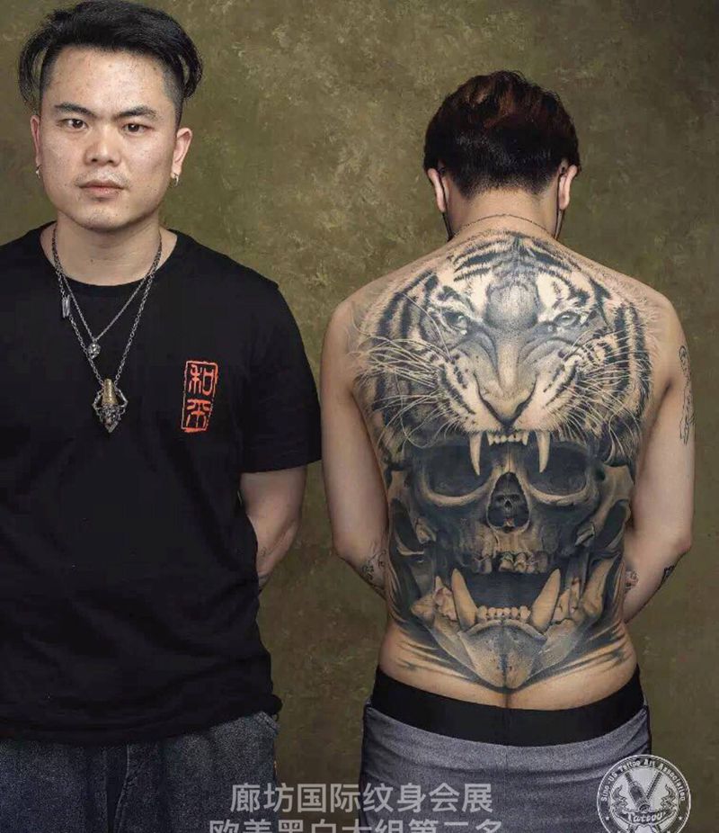 生与死纹身图片_欧美写实纹身图案