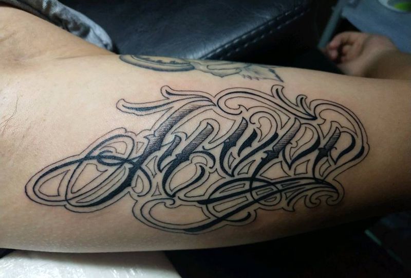 花体英纹身图片_手臂纹身图案