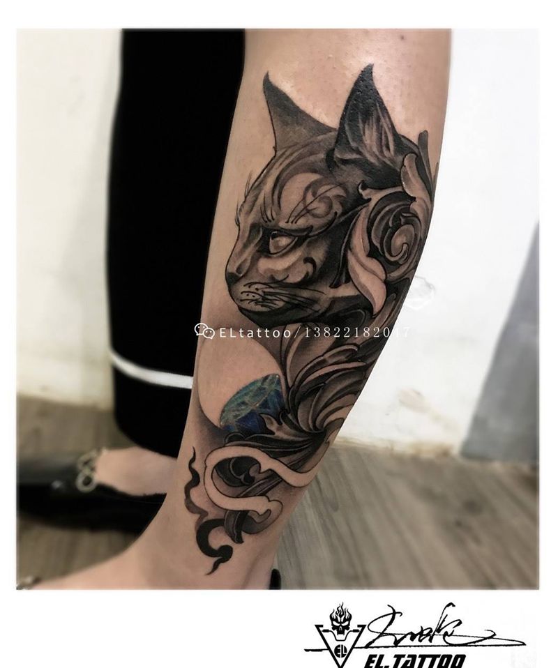 灵猫纹身图片_腿部纹身图案