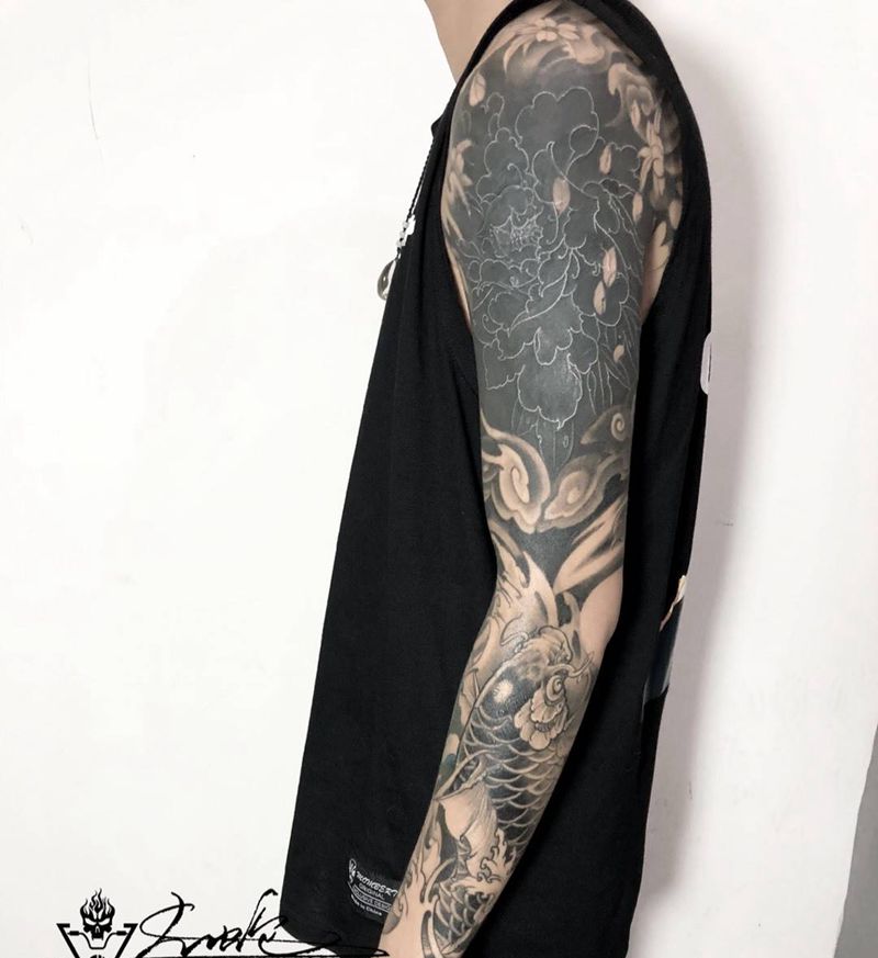 黑臂纹身图片_传统手臂纹身图案