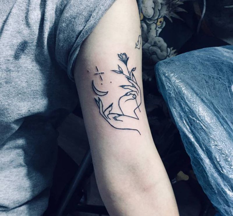 大臂小图纹身图片_手臂纹身图案