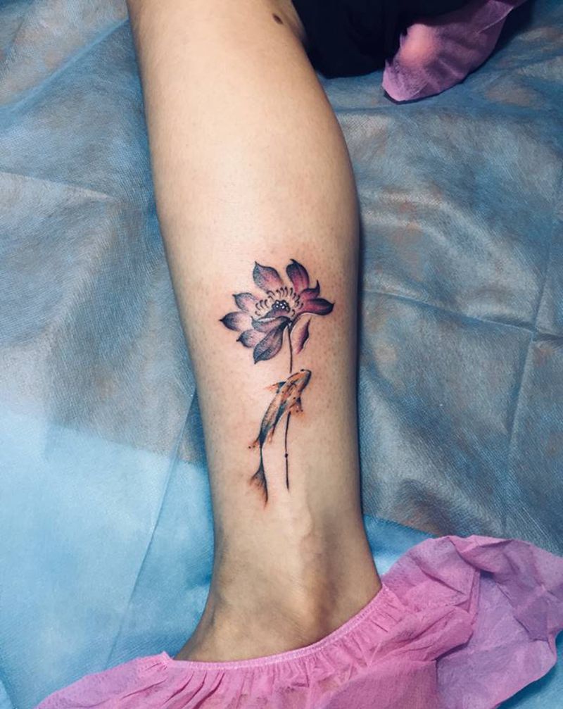 小腿莲花鱼纹身图片_腿部纹身图案