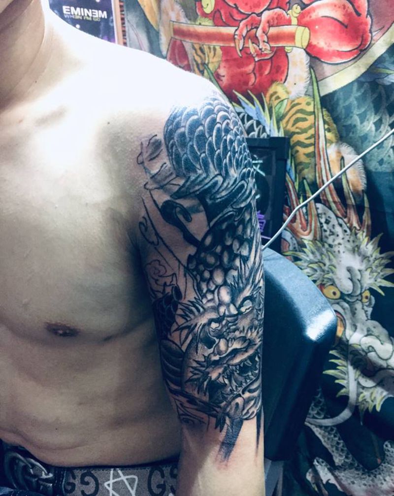 大龙遮盖未完成纹身图片_手臂纹身图案