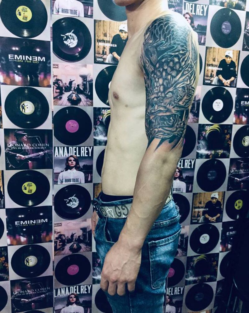 大龙遮盖纹身图片_手臂纹身图案