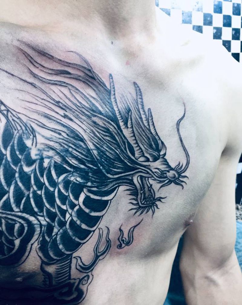 遮盖 未完纹身图片_胸部手臂纹身图案