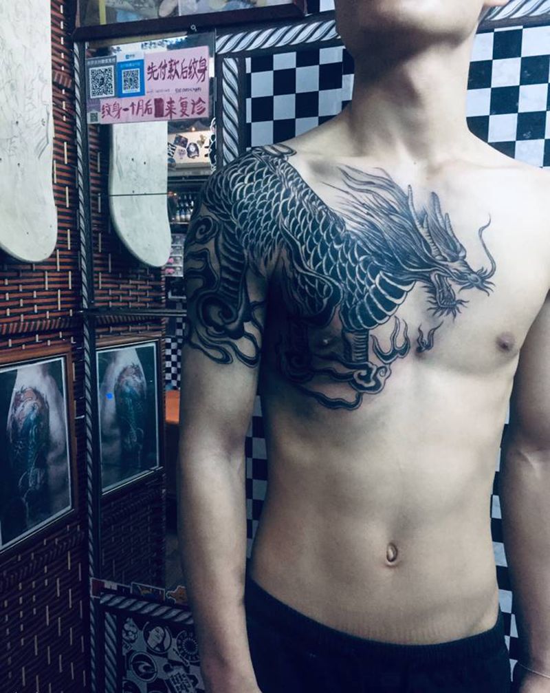 遮盖完成纹身图片_手臂胸部纹身图案