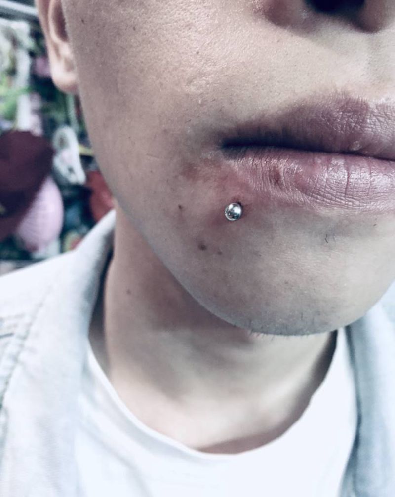 唇钉纹身图片_手臂纹身图案