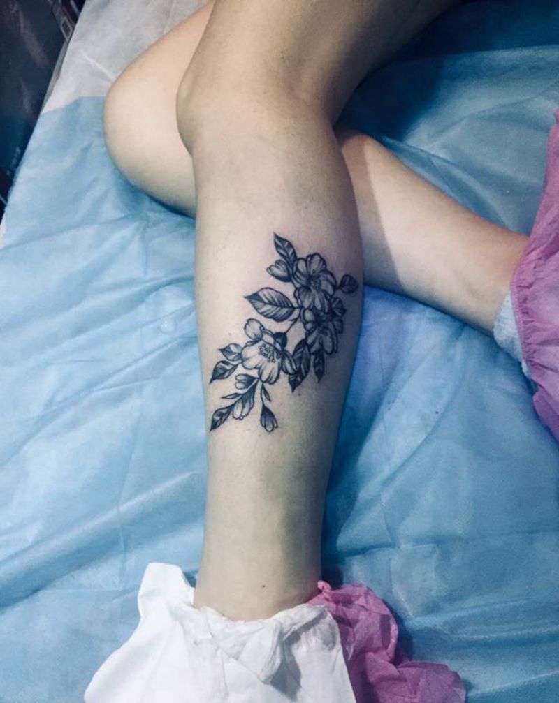 素花纹身图片_腿部纹身图案