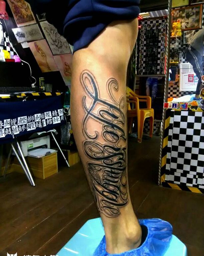 小腿奇卡诺纹身图片