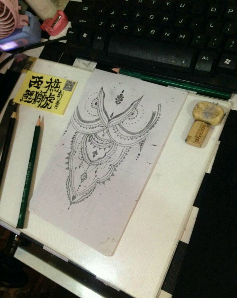 海娜狮子未完纹身图片