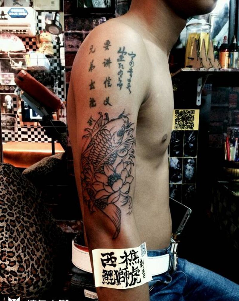 鱼线条纹身图片