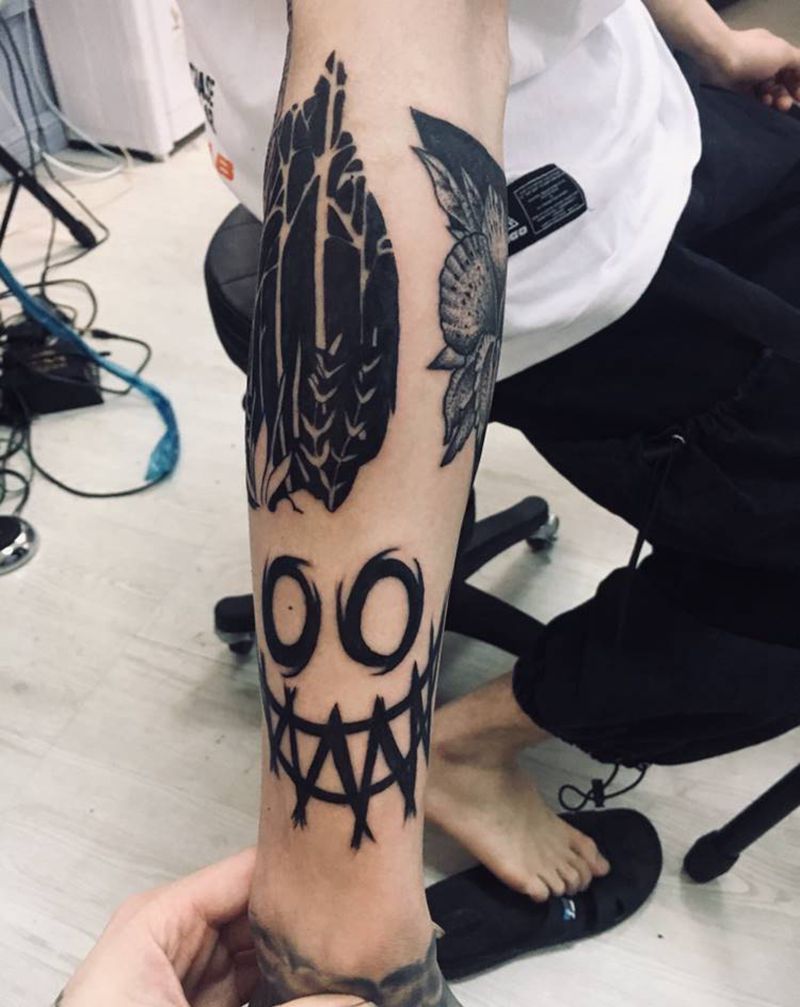 笑脸纹身图片_手部纹身图案