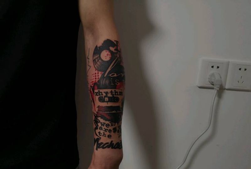 热爱纹身图片_手臂水墨音乐纹身图案