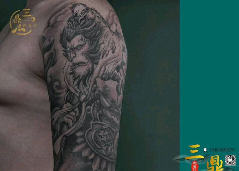 大臂孙猴子纹身图片_手臂纹身图案