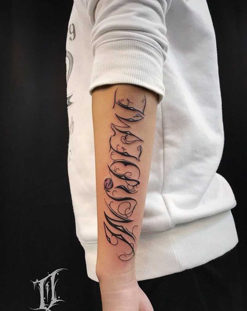 花体纹身图片_手臂花体纹身图案