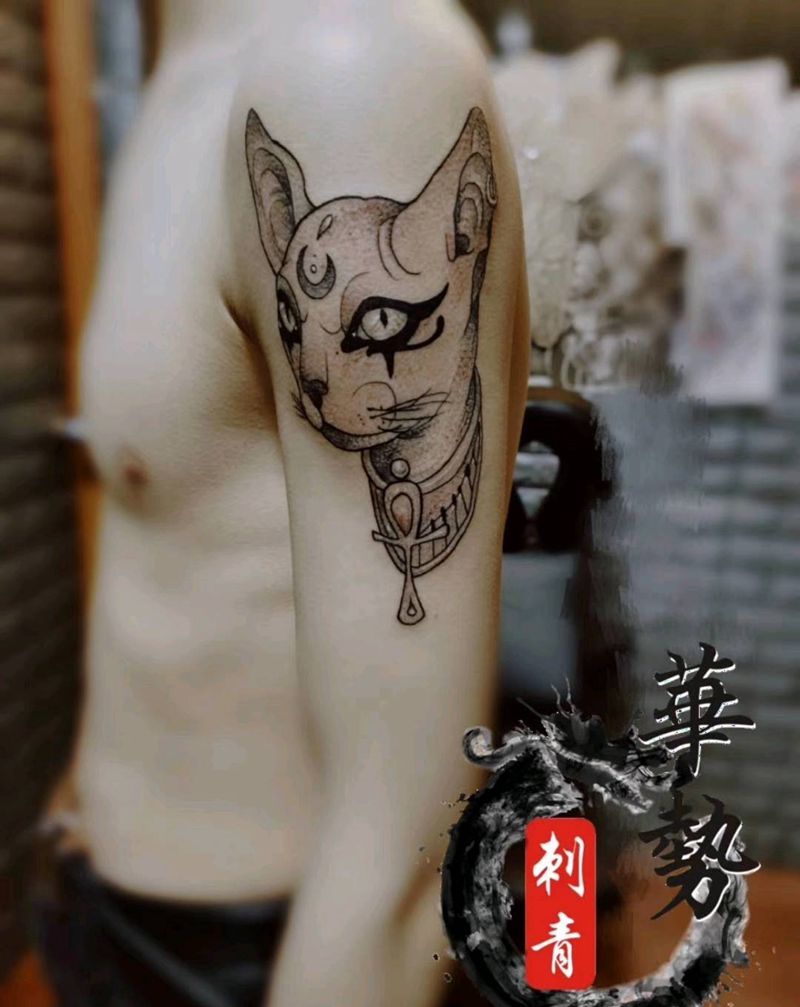 点刺猫纹身图片_手部纹身图案