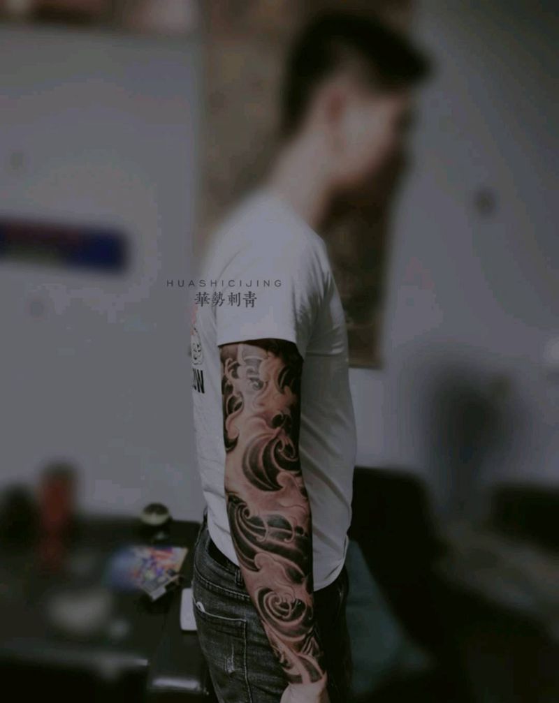 浪臂纹身图片_手部手臂纹身图案