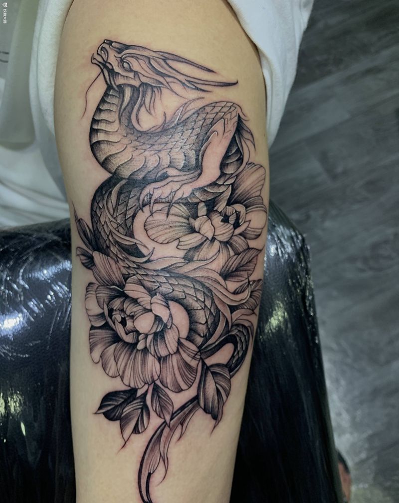 龙素花纹身图片_手臂点刺纹身图案