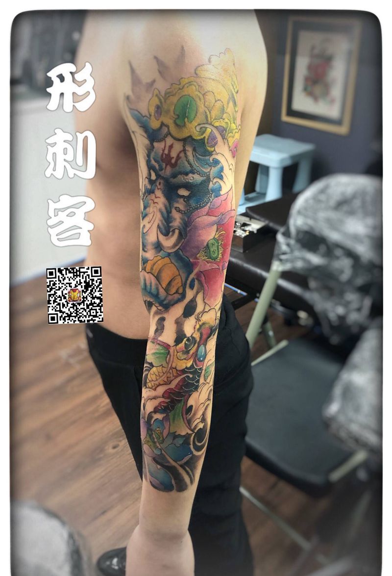 新传统彩色纹身图片_手臂新传统纹身图案