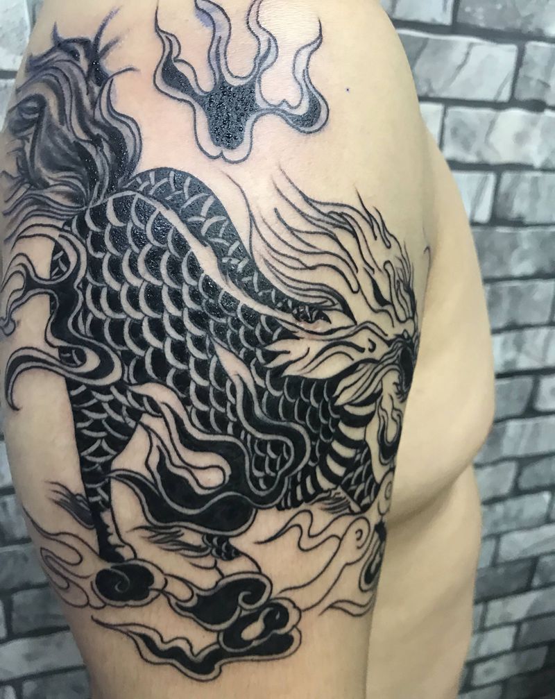 麒麟纹身图片_腿部手部老传统纹身图案