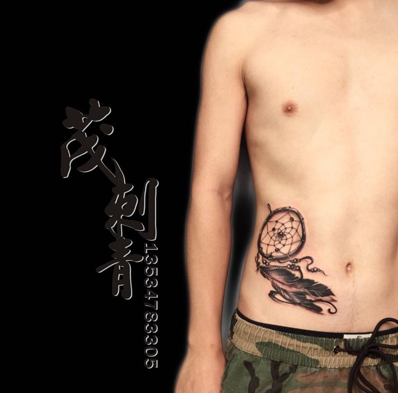 捕梦网纹身图片