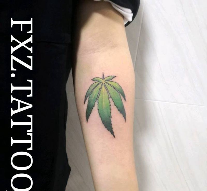 麻叶纹身图片_手臂纹身图案