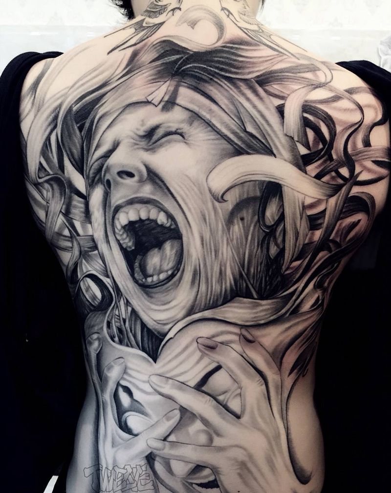 面具纹身图片_成品背部肖像欧美人物纹身图案