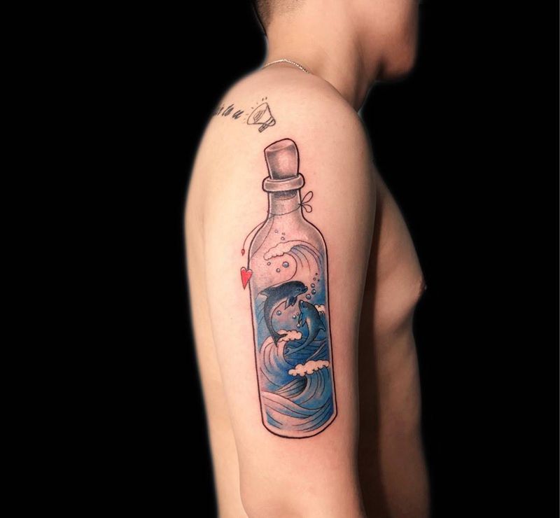 漂流瓶里的世界纹身图片