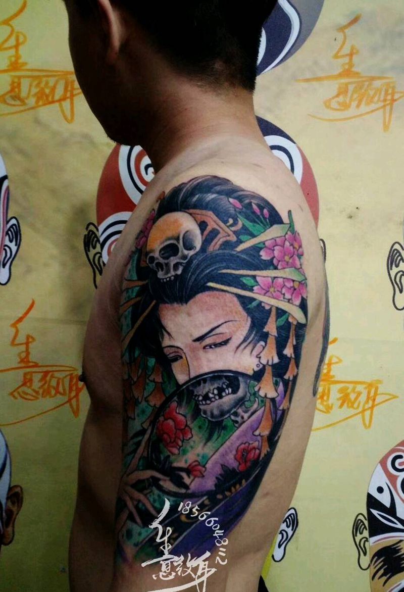 鬼伎纹身图片_手臂新传统水彩纹身图案