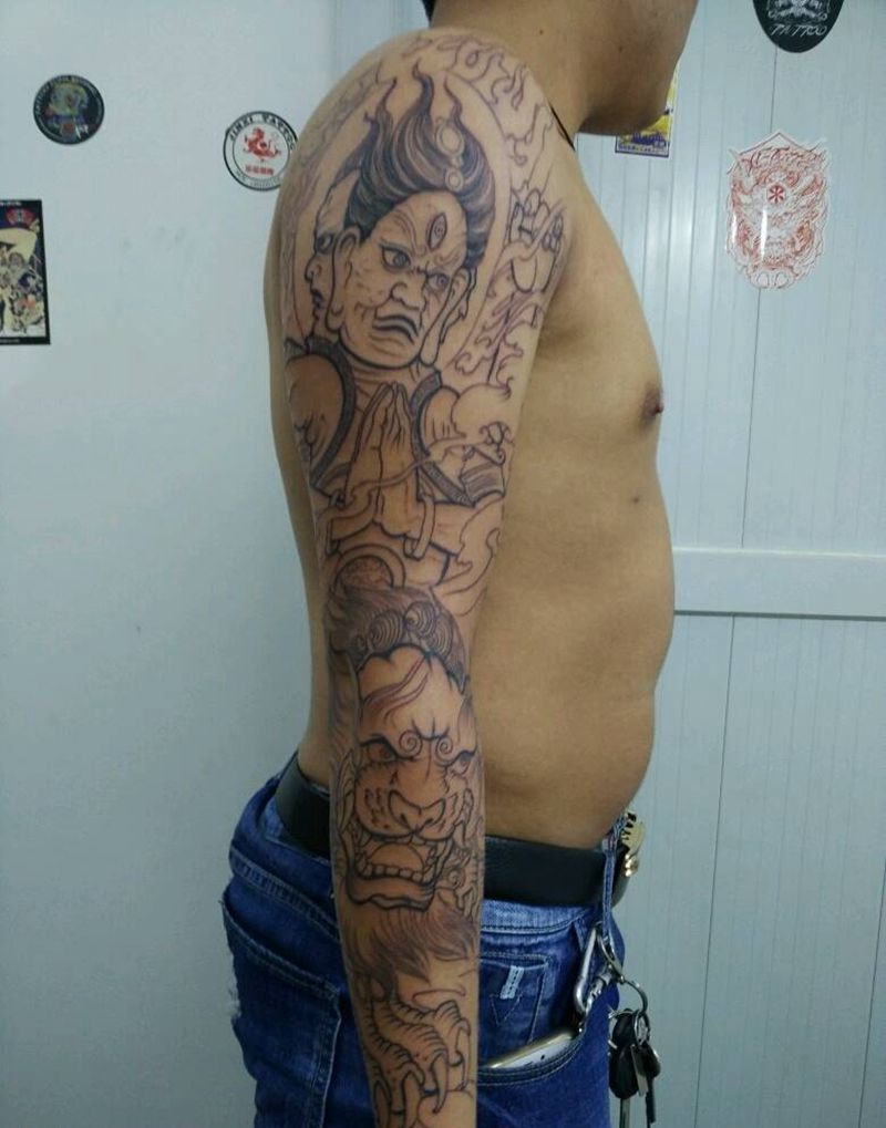 金刚唐狮花臂纹身图片_手臂传统鬼神神兽纹身图案