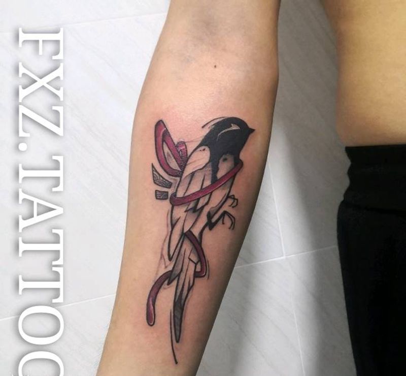 束缚的鸟纹身图片_手臂纹身图案