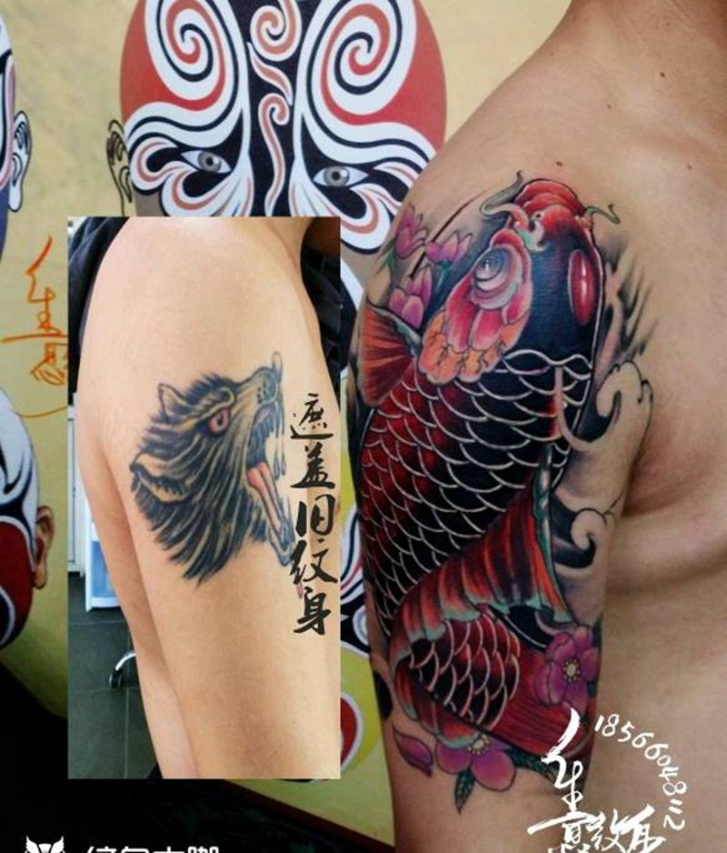 鲤鱼盖狼头纹身图片_肩部手臂新传统纹身图案