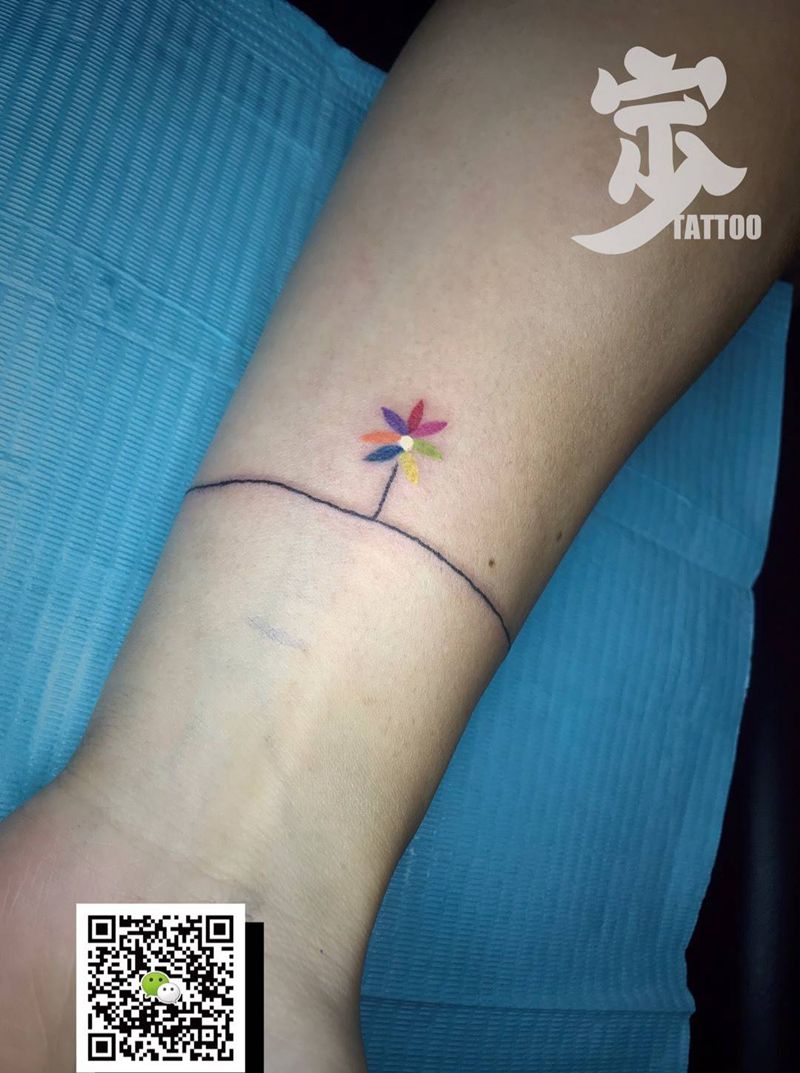 爱的小花花纹身图片_手臂New School水彩七色小花宁少Tattoo纹身图案