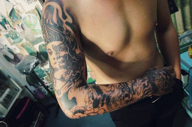 全臂=善恶+牡丹+般若+唐狮纹身图片_手臂传统鬼神成品纹身图案