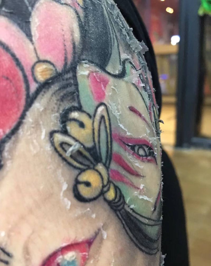 关于皮损纹身图片_臀部纹身图案