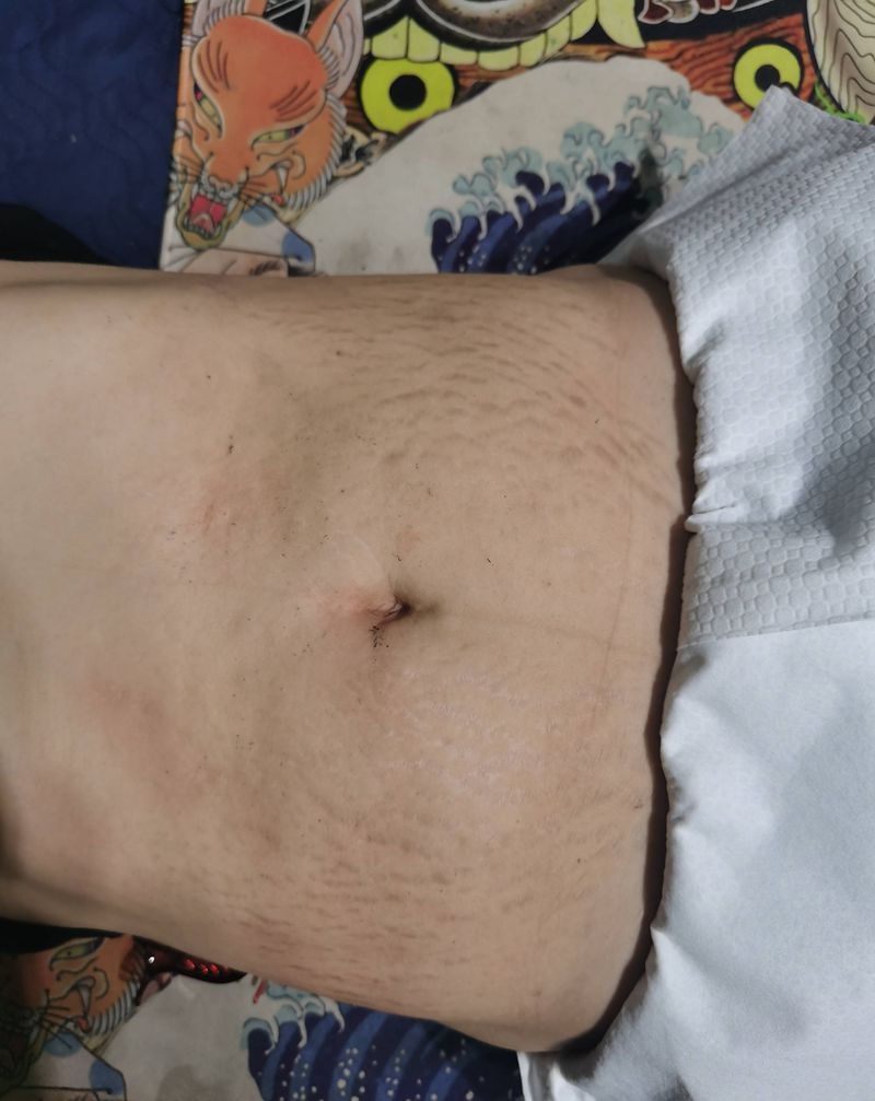 妊娠纹遮盖纹身图片_腹部纹身图案