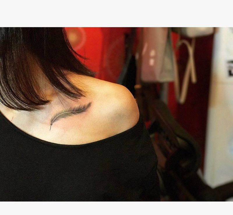 小羽毛纹身图片