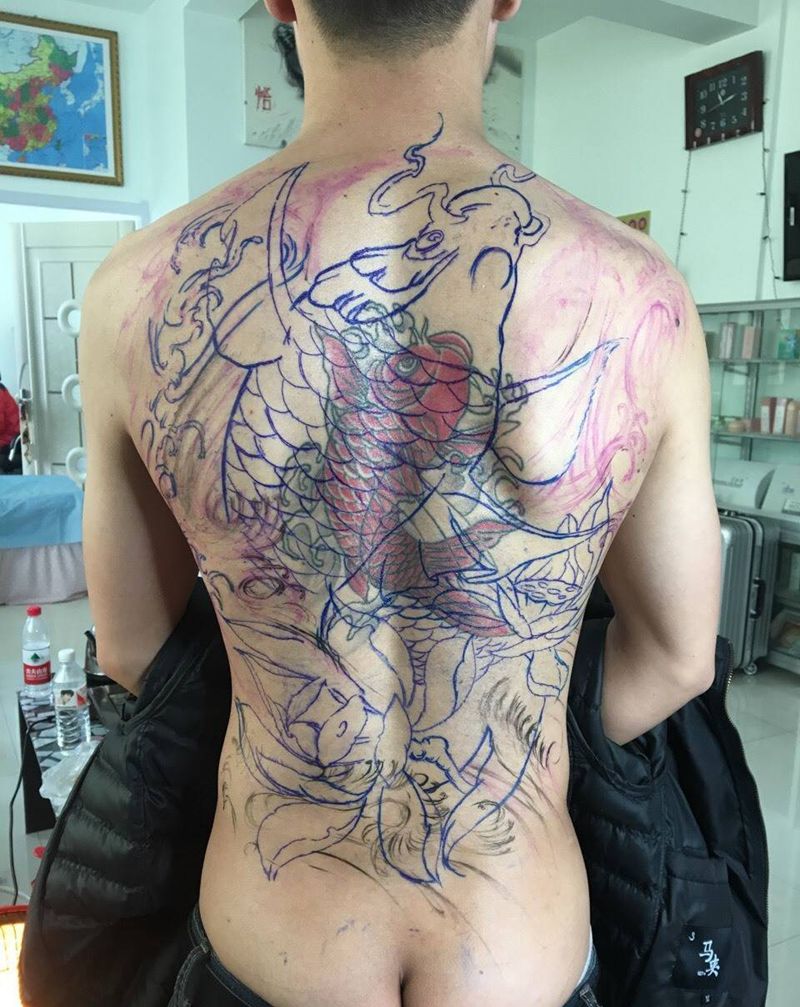 大鱼吃小鱼纹身图片